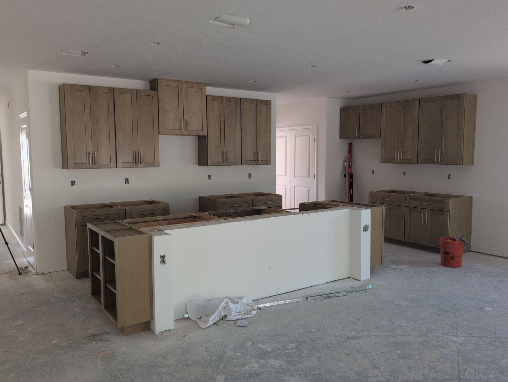 Kitchen during cabinet installation phase